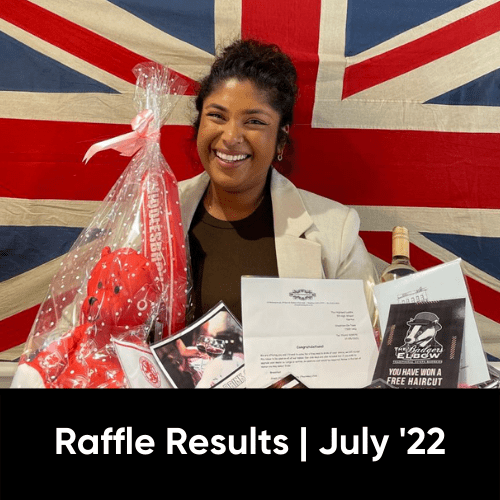 Treatment co-ordinator Joyce shows raffle prizes from our charity raffle